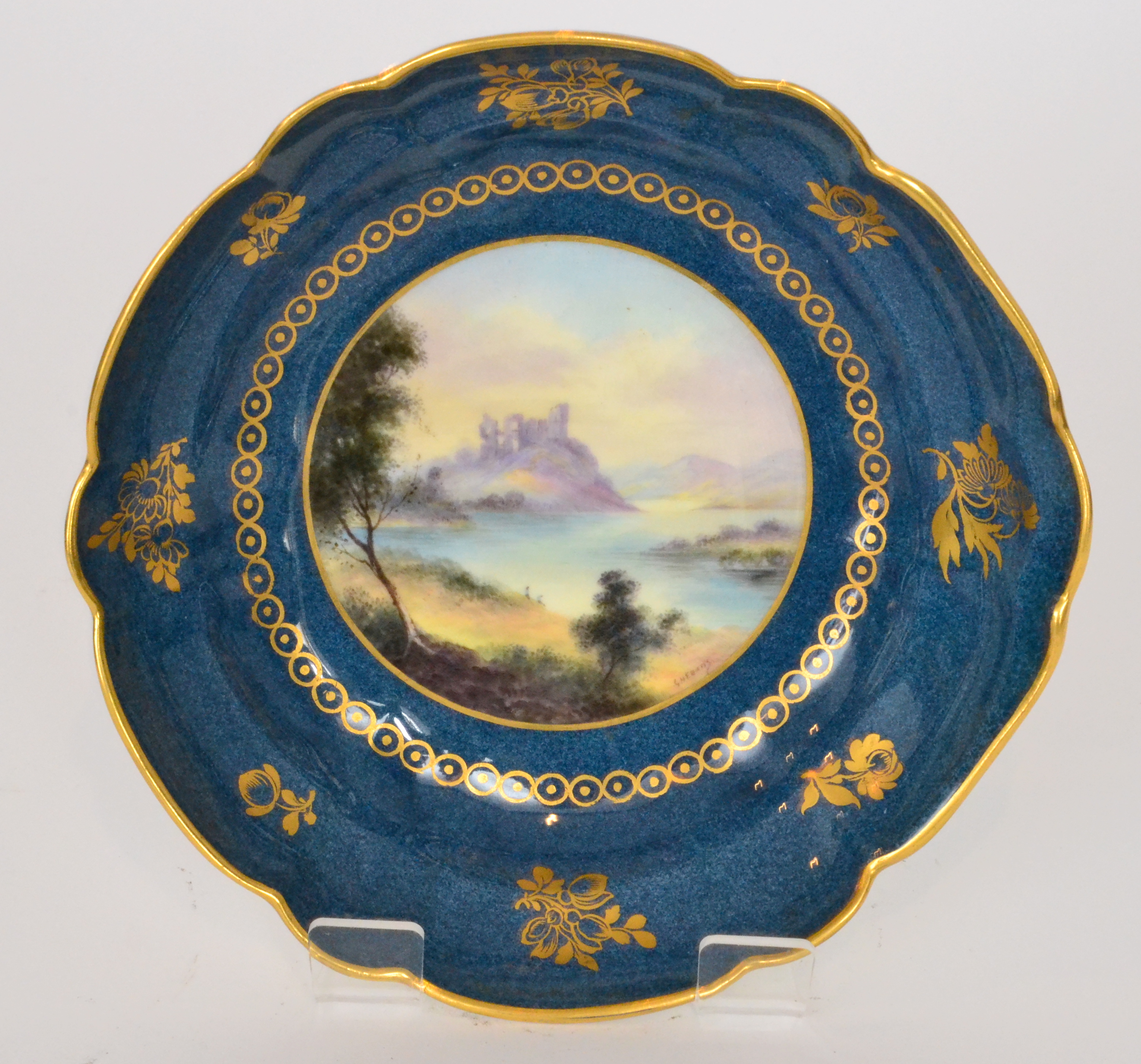 A Royal Worcester fluted dish decorated by G.