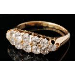 An early 20th Century 18ct diamond dress ring, twelve graduated old cut diamonds,