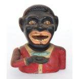 An early 20th Century jolly black man cast iron mechanical money box