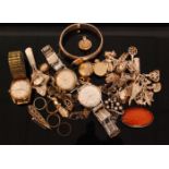 A small parcel lot of assorted jewellery to include watches, silver charm bracelet, brooches,