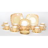 A 1930s Royal Aynsley part teaset comprising eight fluted teacups, thirteen saucers,
