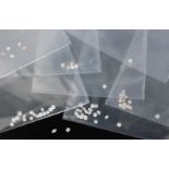 Eight bags of loose diamonds to include brilliant cut, marquise and princess cut,