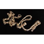 An 14ct white and yellow gold fancy link bracelet formed of half moon crescents spaced by cross