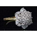 An 18ct diamond cluster ring,