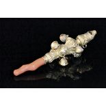 A Georgian Ducal silver gilt baby's teething rattle and whistle,