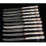 A set of twelve George III hallmarked silver dessert knives, each in the Kings Hour Glass pattern,