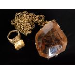 A 1970s ritulated or 'angels hair' quartz pendant,