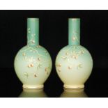 A pair of late 19th Century Harrach vases of globe and shaft form,