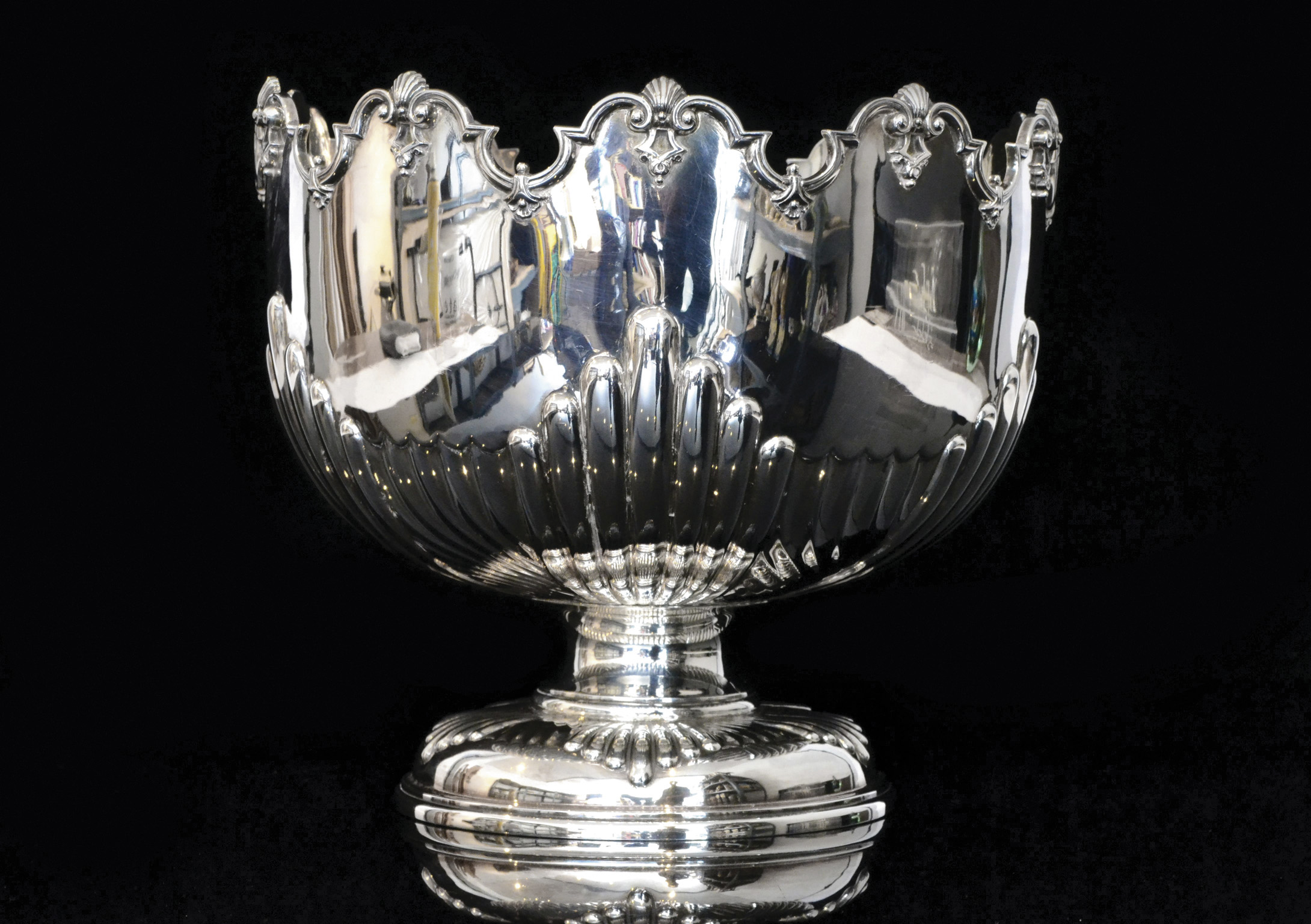 A hallmarked silver pedestal Monteith bowl with part fluted decoration weight approximately 46oz,