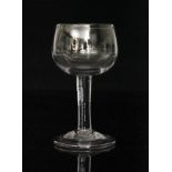 A mid 18th Century mead glass circa 1740 with large ovoid bowl above a plain stem,