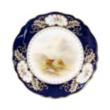 A Royal Worcester cabinet plate decorated by John Stinton with Highland cattle against a