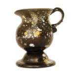 A small 18th Century Wrockwardine glass jug with a domed and folded foot below ovoid body with