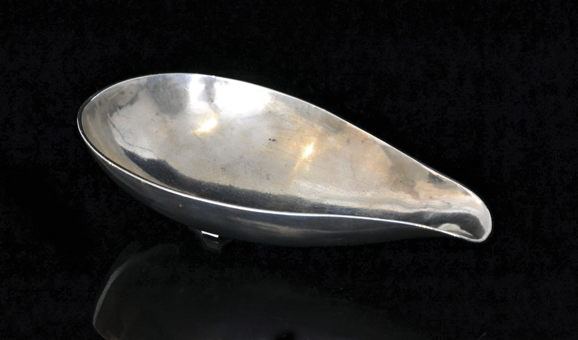 A George II possibly Irish or American provincial silver pap boat of plain form, length 14cm,