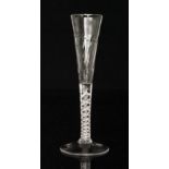 A mid 18th Century Ratafia glass circa 1755 having a slender conical bowl with basal moulding above