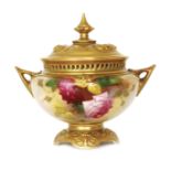 A Royal Worcester twin handled pot pourri vase and cover decorated by Ethel Spilsbury with hand