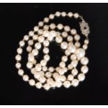 A single string of graduated cultured pearls with 9ct white gold mount,