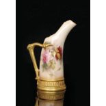 A Royal Worcester tusk jug decorated with a hand painted crimson and pink rose in the style of