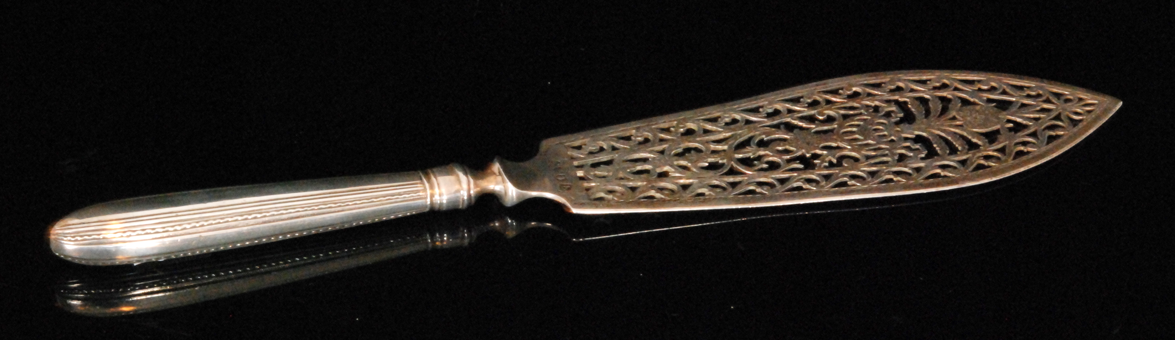 A George III hallmarked silver fish slice,
