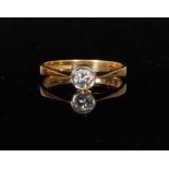 An 18ct diamond solitaire ring, collar set brilliant cut stone weight approximately .