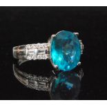 A white gold blue zircon and diamond cluster ring,