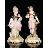 A pair of late 19th to early 20th Century Meissen figurines modelled as a lady and gentleman,