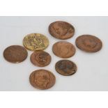 Four bronze commemorative medals,