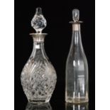 A mid 20th Century silver mounted cut glass decanter of baluster form, with plain silver collar,