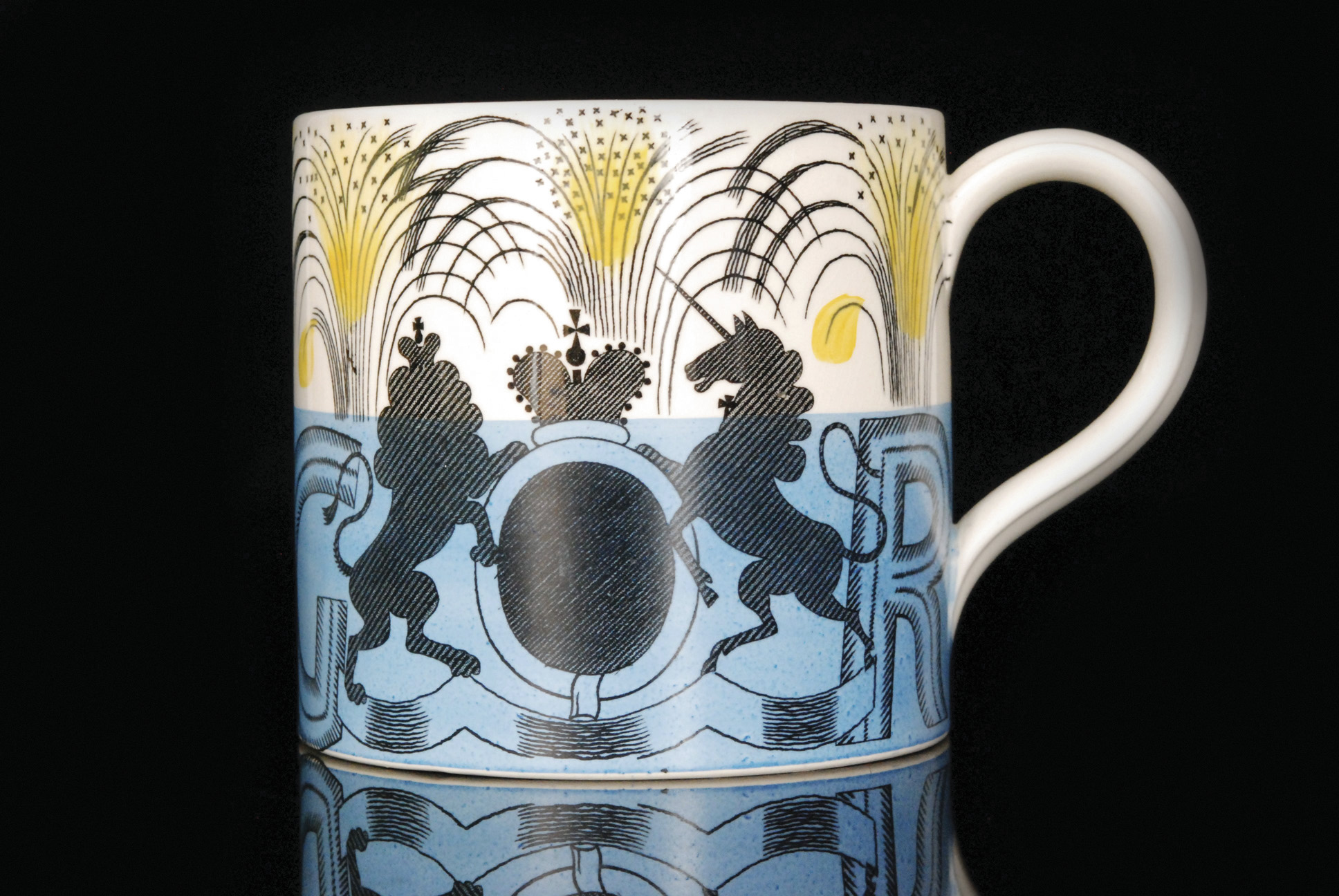 An Eric Ravilious for Wedgwood 1937 commemorative mug 'To commemorate the Coronation of their