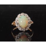 An 18ct opal and diamond cluster ring,