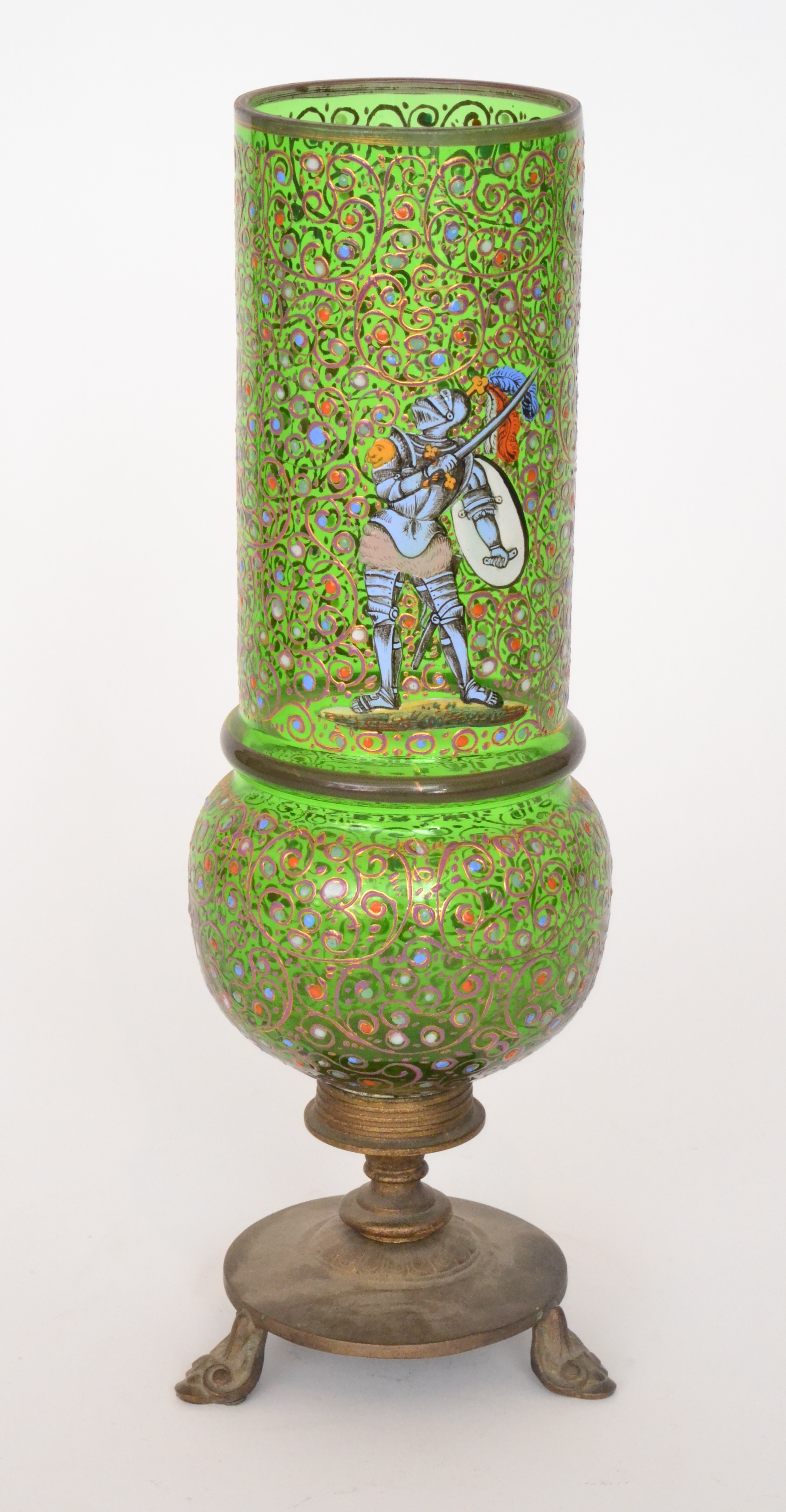 A late 19th Century Bohemian glass vase of sleeve form with a spherical base mounted to a gilt