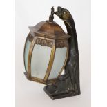 Unknown - French - A late 19th to early 20th Century bronze wall lantern,