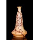 Legras - A late 19th Century cameo glass vase cased in caramel over amber and cut and enamelled