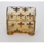 Emille Galle - A small late 19th Century amber crystal glass box of rectangular form with a domed