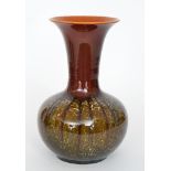 Christopher Dresser - Linthorpe - A late 19th Century vase of globe and flared shaft form,