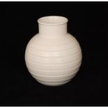 Keith Murray - Wedgwood - A 1930s vase of ovoid form with eight incised horizontal bands,