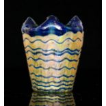 Kralik - An early 20th Century vase of fluted cylindrical form with a quatrelobed rim,