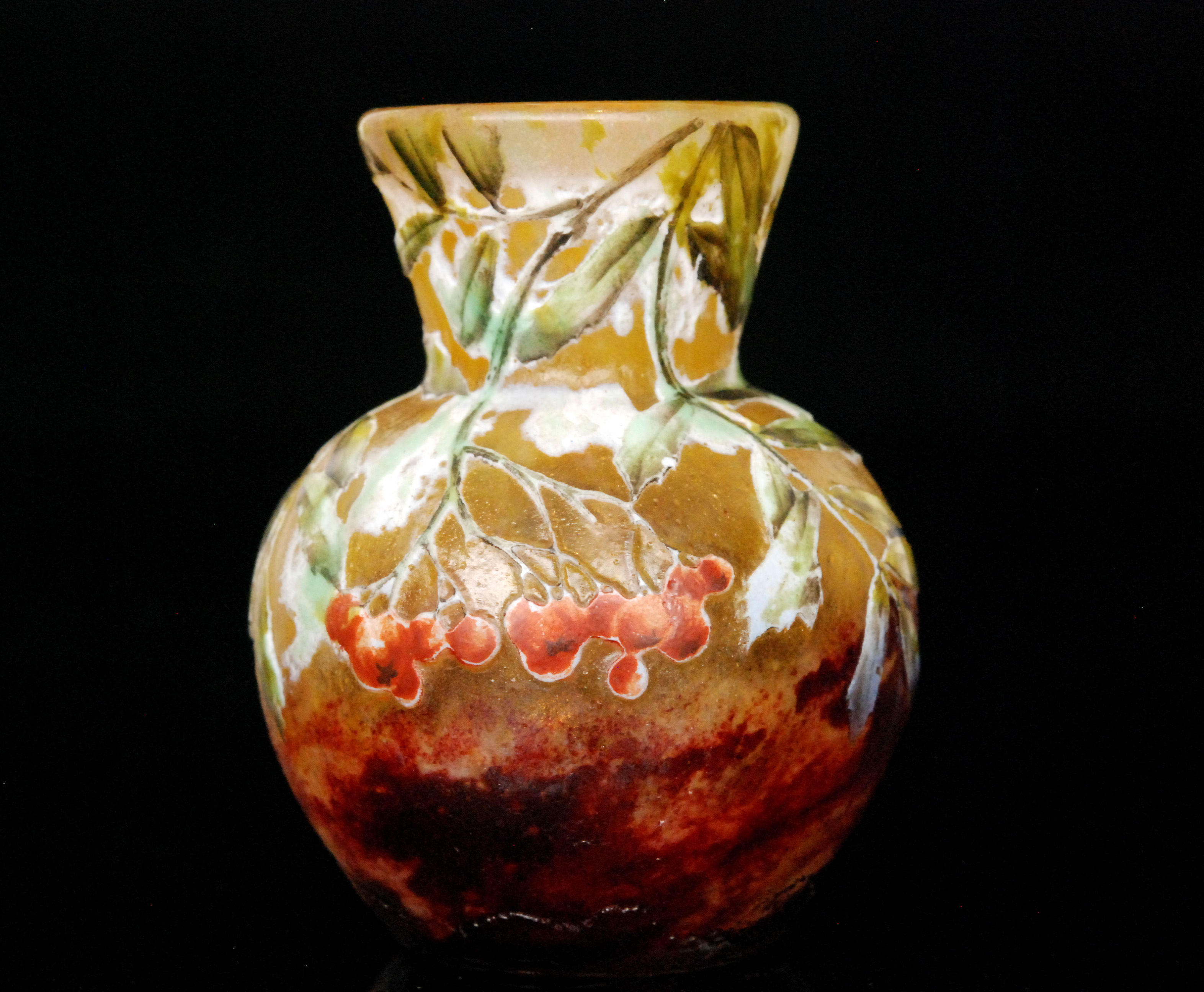 Daum - A small early 20th Century cameo glass vase of spherical form with flared collar,