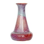 Ruskin Pottery - An early 20th Century high-fired vase of compressed form with a flared collar neck,