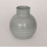 Keith Murray - Wedgwood - A 1930s vase of ovoid form with eight incised horizontal bands,