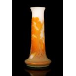 Galle - A large early 20th Century cameo glass vase of footed sleeve form with everted rim,