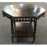 Unknown - An ebonised and gilt-highlighted occasional table of octagonal form with a spindle turned