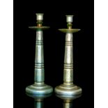 Loetz - A pair of large glass candlesticks with a stepped circular base rising to a tapered column