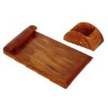 Carvacraft - A 1930s butterscotch phenolic Bakelite note pad holder and a matching desk tidy,