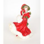 A boxed Royal Doulton figurine entitled Christmas Day, HN 4723,