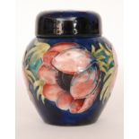 A Moorcroft ginger jar and cover decorated in the Anemone pattern with tubelined flowers and