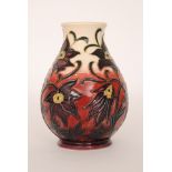 A Moorcroft Pottery baluster vase decorated in the Pasque Flower pattern designed by Vicky Lovatt,