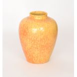 A Royal Lancastrian vase of high shouldered form decorated in an 'orange peel' glaze with yellow