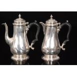 A George VI hallmarked silver cafe au lait set, of plain baluster form with hinged cover,