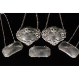 A set of three George V hallmarked silver decanter labels,