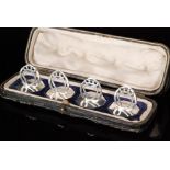 A set of Edwardian hallmarked silver menu holders,